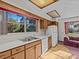 Bright kitchen with wood cabinets, double sink and dishwasher at 5100 Helen Ct, St Cloud, FL 34772