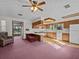 Kitchen features a breakfast bar and access to backyard at 5100 Helen Ct, St Cloud, FL 34772