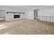 Living room features fireplace and neutral carpeting at 5100 Helen Ct, St Cloud, FL 34772
