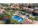 Aerial view of condo building near tennis court at 6141 Metrowest Blvd # 307, Orlando, FL 32835