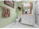 Clean bathroom with white vanity, toilet, and a shower/tub combo at 6141 Metrowest Blvd # 307, Orlando, FL 32835