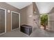 Condo building entrance with storage and security features at 6141 Metrowest Blvd # 307, Orlando, FL 32835