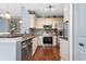 Modern kitchen with stainless steel appliances at 6141 Metrowest Blvd # 307, Orlando, FL 32835