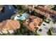 Community pool with surrounding landscaping at 6141 Metrowest Blvd # 307, Orlando, FL 32835