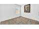 Spacious bedroom with neutral wall and carpeting at 696 Tortugas St, Haines City, FL 33844