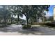 Gated community entrance with mature trees at 1150 Lake Shadow Cir # 3304, Maitland, FL 32751