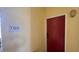 Red front door to unit 3304 in a condo building at 1150 Lake Shadow Cir # 3304, Maitland, FL 32751