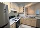 Efficient kitchen featuring ample cabinetry and modern appliances at 1150 Lake Shadow Cir # 3304, Maitland, FL 32751
