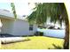 House exterior and backyard with patio at 1569 Thetford Cir, Orlando, FL 32824