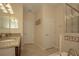 Large bathroom with double vanity and soaking tub at 1569 Thetford Cir, Orlando, FL 32824