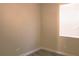 Simple bedroom with beige walls and wood flooring at 1569 Thetford Cir, Orlando, FL 32824
