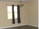 Simple dining room with window and wood flooring at 1569 Thetford Cir, Orlando, FL 32824