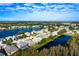 Aerial view of community with lake and homes at 2943 Elbib Dr, Saint Cloud, FL 34772