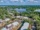 Community view showcasing lake and amenities at 4106 Dijon Dr # 4106E, Orlando, FL 32808