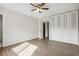 Bright bedroom with wood-look floors and spacious closet at 411 Sheoah Blvd # 37, Winter Springs, FL 32708