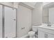 Bathroom with a walk-in shower, white vanity, and toilet at 670 Summit River Dr, Apopka, FL 32712
