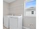 Laundry room with washer, dryer, and overhead shelving at 670 Summit River Dr, Apopka, FL 32712