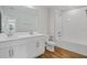 Main bathroom with double sinks, tub and separate shower at 680 Summit River Dr, Apopka, FL 32712