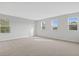 Spacious bedroom with carpet and multiple windows at 680 Summit River Dr, Apopka, FL 32712