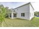 House exterior showcasing backyard and landscaping at 680 Summit River Dr, Apopka, FL 32712