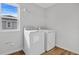 Laundry room with washer, dryer, and overhead shelving at 680 Summit River Dr, Apopka, FL 32712