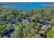 Aerial view of house and lakefront neighborhood at 729 Main Street, Windermere, FL 34786