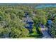 Aerial view showcasing lakefront property at 729 Main Street, Windermere, FL 34786