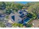 Aerial view showing house, pool, and lake view at 729 Main Street, Windermere, FL 34786