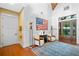 Bright and airy entryway with hardwood floors and a large American flag artwork at 729 Main Street, Windermere, FL 34786