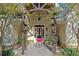 Elegant front entry with a charming red door at 729 Main Street, Windermere, FL 34786