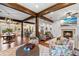 Cozy living room featuring a fireplace, comfortable seating, and a large TV at 729 Main Street, Windermere, FL 34786