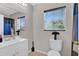 Clean bathroom with updated vanity, toilet, and shower at 905 Gascony Ct, Kissimmee, FL 34759