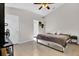 Spacious bedroom with large bed, ceiling fan, and ample closet space at 905 Gascony Ct, Kissimmee, FL 34759