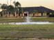 Community clubhouse with water fountain feature at 905 Gascony Ct, Kissimmee, FL 34759
