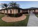 Well-maintained building exterior with landscaping and walkway at 905 Gascony Ct, Kissimmee, FL 34759