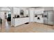 Clean and functional kitchen with white cabinets and stainless steel appliances at 905 Gascony Ct, Kissimmee, FL 34759