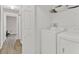 Convenient laundry room with washer, dryer, and storage at 905 Gascony Ct, Kissimmee, FL 34759