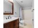 Clean bathroom with a shower/tub combo and updated vanity at 1032 Tawny Eagle Dr, Groveland, FL 34736