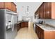 Modern kitchen with stainless steel appliances at 1032 Tawny Eagle Dr, Groveland, FL 34736