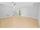 Spacious living room with tile floors and neutral walls at 1032 Tawny Eagle Dr, Groveland, FL 34736