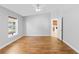 Living room with tile floors and access to kitchen at 1032 Tawny Eagle Dr, Groveland, FL 34736