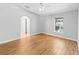 Living room with tile floors and access to hallway at 1032 Tawny Eagle Dr, Groveland, FL 34736