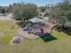 playground with slides, climbing structures, and shaded seating at 1032 Tawny Eagle Dr, Groveland, FL 34736