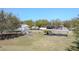 Community playground with playset, picnic tables, and shaded areas at 1032 Tawny Eagle Dr, Groveland, FL 34736