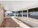 Spacious screened porch with brick pavers at 1032 Tawny Eagle Dr, Groveland, FL 34736