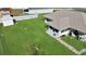 Backyard with shed, partially fenced yard, and walkway at 12876 Sw 64Th Cir, Ocala, FL 34473