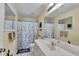Clean bathroom with shower/tub combo and vanity at 12876 Sw 64Th Cir, Ocala, FL 34473