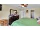 Bright bedroom with double bed and built-in dresser at 12876 Sw 64Th Cir, Ocala, FL 34473