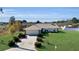 Single story house with a large yard and shed at 12876 Sw 64Th Cir, Ocala, FL 34473