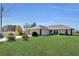 Single-story home with attached garage and large yard at 12876 Sw 64Th Cir, Ocala, FL 34473